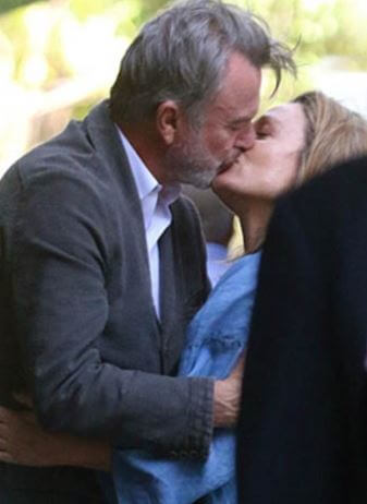 Noriko Watanabe's ex-husband (Sam Neill) with a rumored girl.